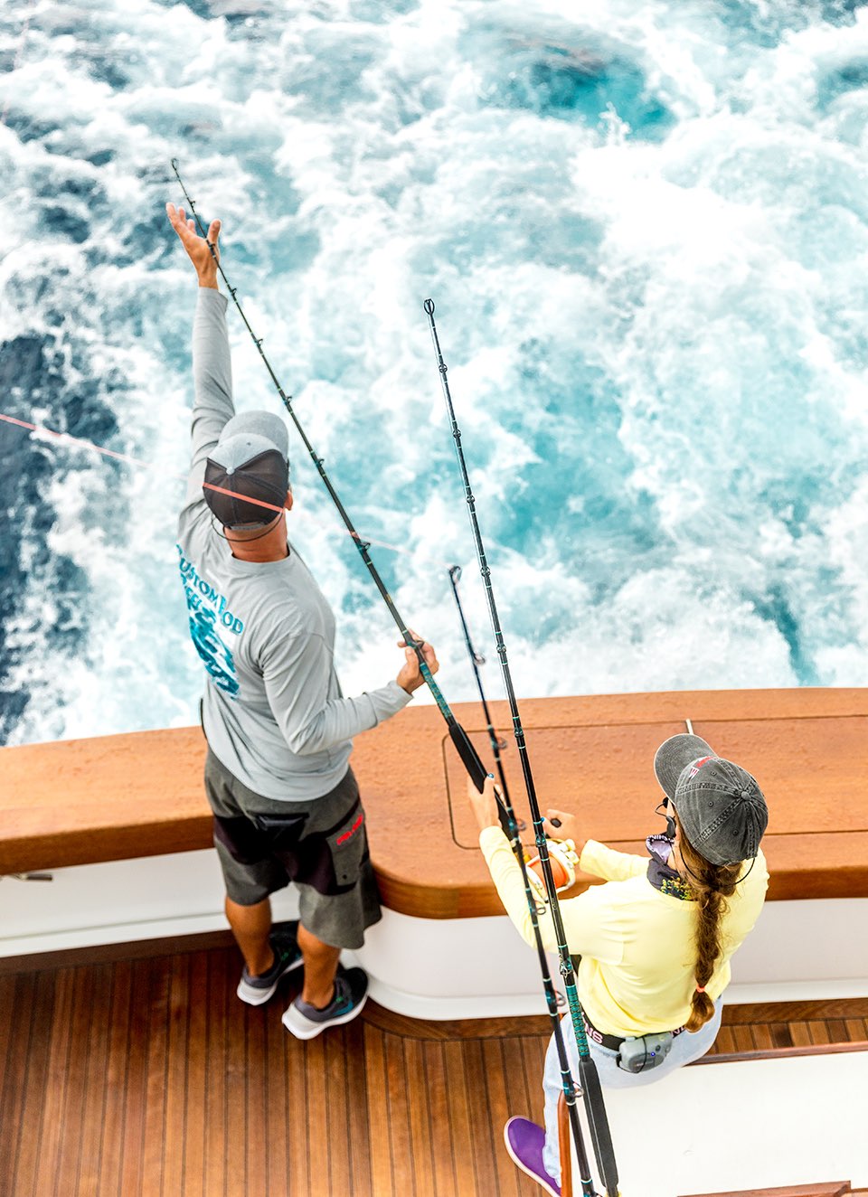 couple on the reef with fish around