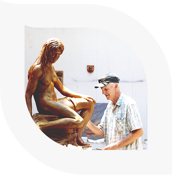 Artist working in a sculpture