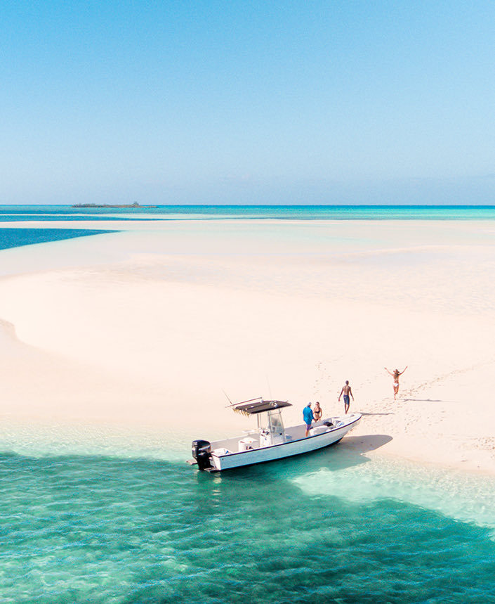 Couple arriving to a beatiful beach